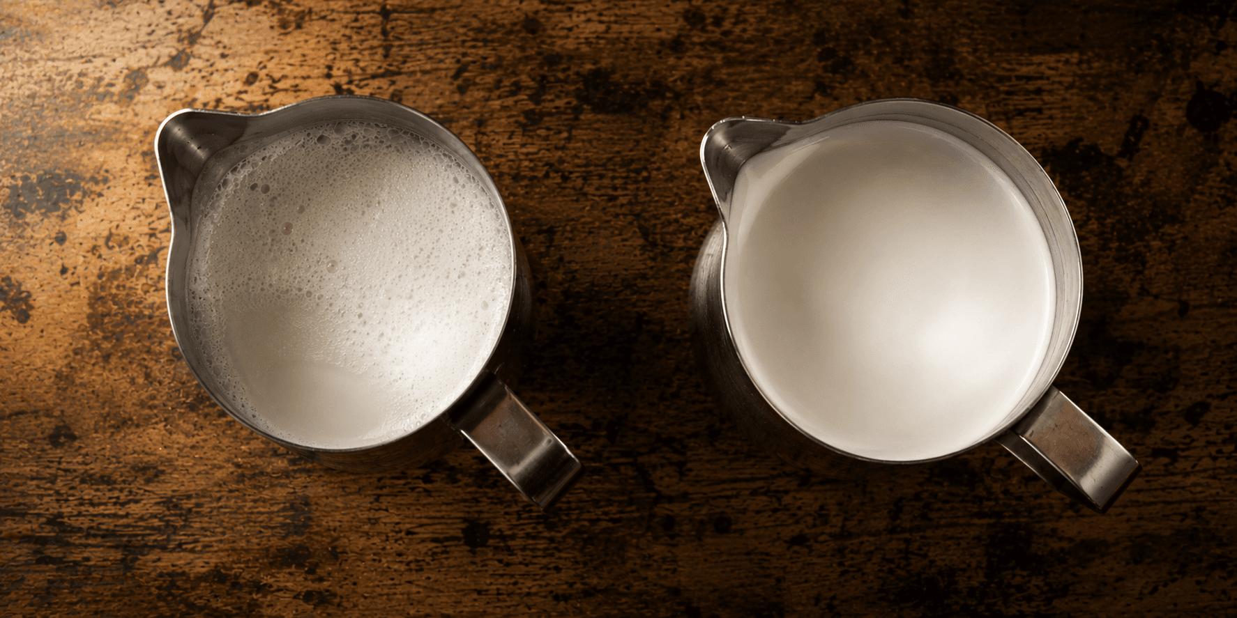 Side by side steamed milk comparison — separated milk vs freshly swirled ready-to-pour microfoam