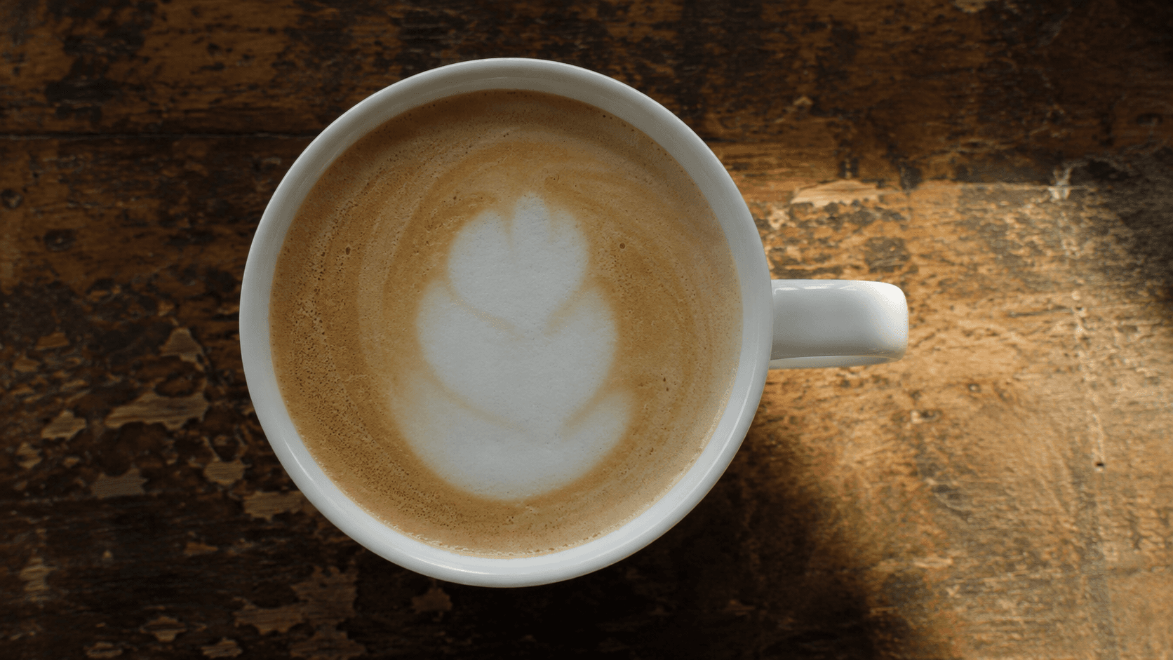 Latte art tulip with merged drops and low contrast — common beginner mistake